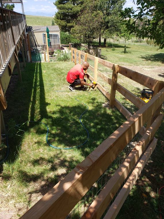 Fastening wire mesh infill to a new split-rail fence frame