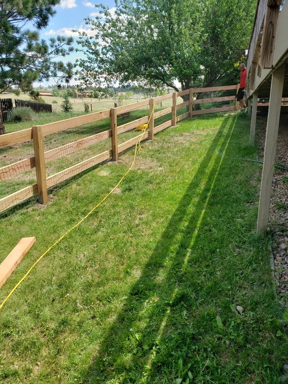 Split-rail and wire fence, full backyard run